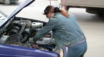 Mechanic refueling airplane