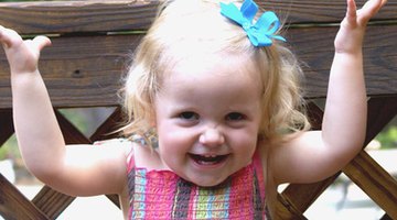 Help a toddler learn correct behaviour by modelling the behaviour that she needs to display.