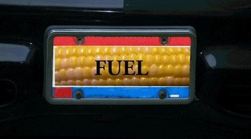 close-up of a person's hand holding a fuel pump