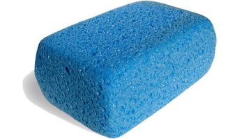Sponges are soft enough to use on easily scratched natural stone surfaces.