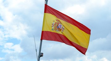 The Spanish flag is defined by red and yellow bands and a crest.