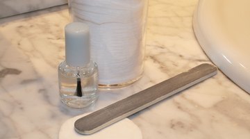 A nail file helps wear down Super Glue residue.