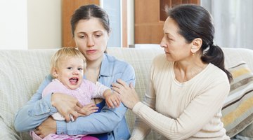 Mother hugs child good-bye