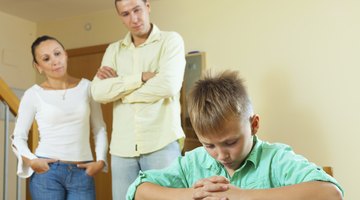 Father and son having fun while shaving in bathroom