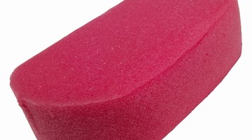 A sponge cleans microfiber without damaging the material.