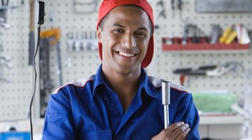 auto mechanic at car suspension repair work