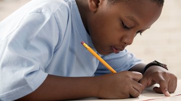 Girl writing a greetings card