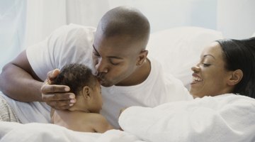 newborn baby in bathtub