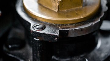 Car interior, close-up of foot on pedal,