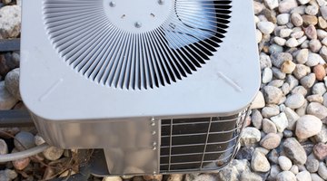 Man inspecting air conditioning unit