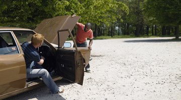 A woman spreading her hands out of a car's window