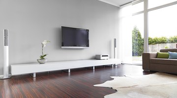 White living room with wood floor