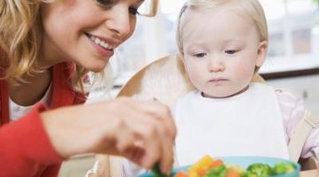 Complementary feeding provides crucial interaction and stimulation.