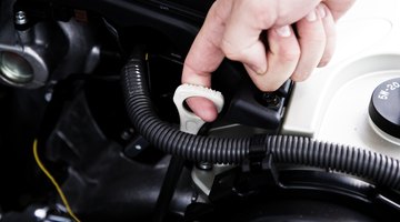 Man fixing car