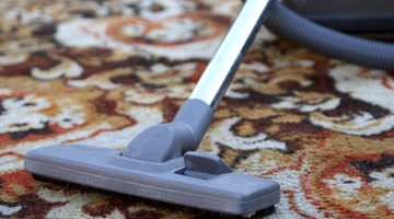 Vacuum your wool rug weekly to remove and draw up loose fibers