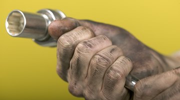 Man looking at car engine