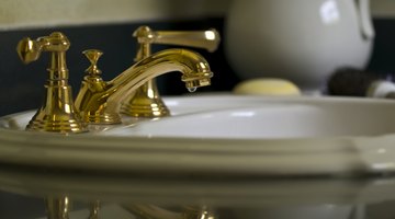 A brass bathroom faucet.