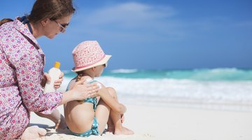 Mother makes healthy massage for baby