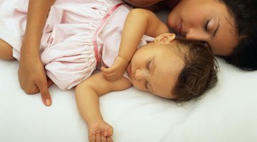 Newborn baby girl sleep first days of life.