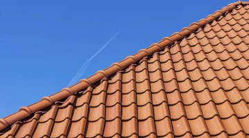 If you have a terracotta tile roof green is a good choice for a trim color.