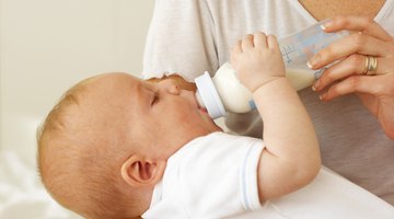 Baby eating with spoon
