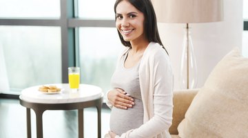 Pregnant woman drinking tea