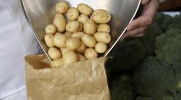 The flavour of a new potato is enhanced by boiling or steaming.