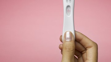 woman honding negative pregnancy test