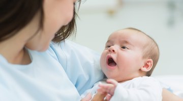 Baby chewing on teething ring