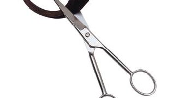 A pair of hair cutting scissors serve as the essential tool to shape any curly hair style.