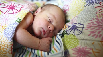 Newborn Asian baby girl in hospital