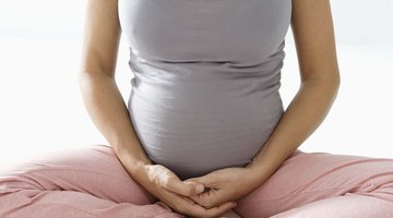 Pregnant woman doing squats