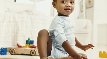 Portrait of a peaceful baby sleeping in his cradle at home