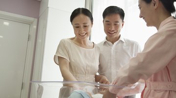 Mother and son looking in mirror