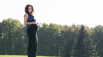 Pregnant woman doing squats
