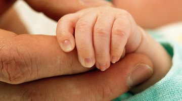 Baby receiving foot massage