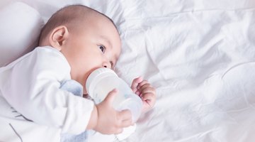 Cute child breastfeeding