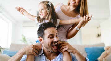 close-up of a family having fun at the beach