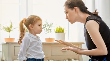 Mother hugs child good-bye