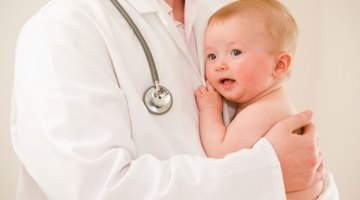 Doctor Examining Child's Eyes In Doctor's Office