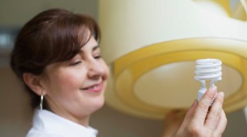 Top  of woman's head over office cubicle