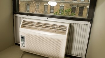 Salesgirl showing air conditioner to man in supermarket