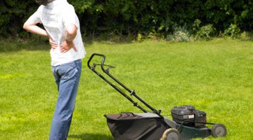 man with lawn mower
