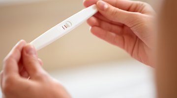 Man and woman with pregnancy test