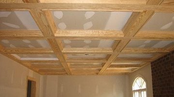 You can clad your faux beams with either stain grade or paint grade finish trim