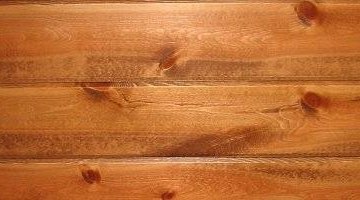 Knotty pine paneling stained 