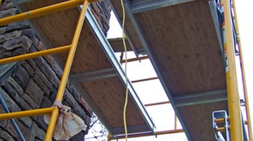 Use a scaffold for easy access to the roof.