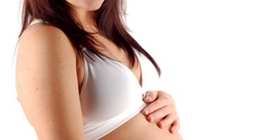 woman honding negative pregnancy test