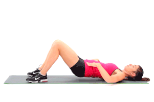 Pregnant woman lying on exercise mat