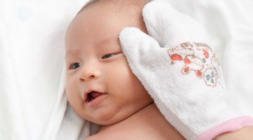newborn baby in bathtub